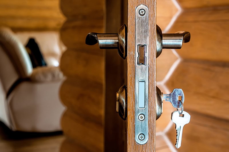 Electronic Locking Systems Keep Patients, Staff, Medical Data Safe. Photo of a door with keys in the lock.